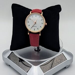 Elegant Red Watch with Gold Accents